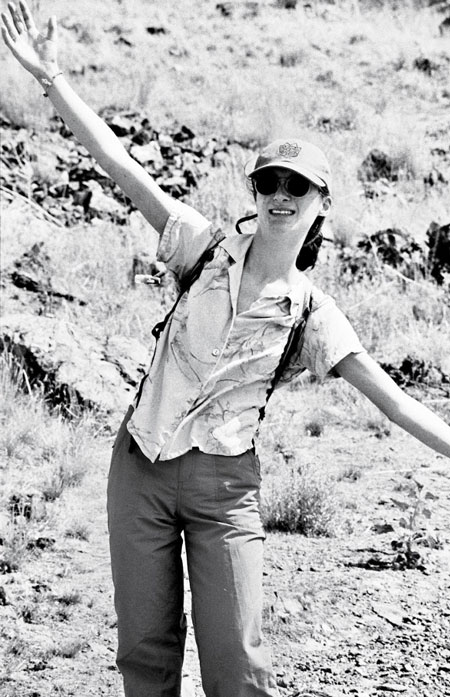 Black and white photo of Hannah hiking.