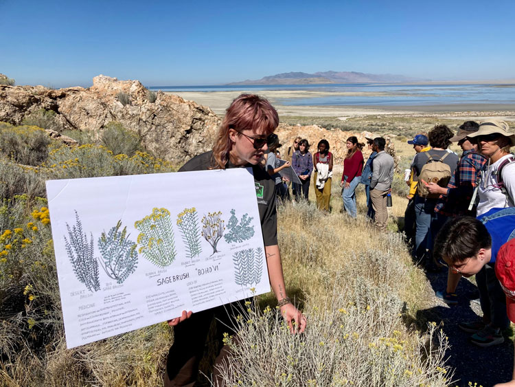 Fiona points out plants to attendees of the symposium on Great Salt Lake at Antelope Island.