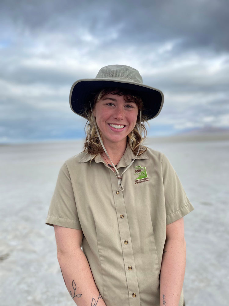 Fiona poses in front of Great Salt Lake in her Antelope Island shirt.